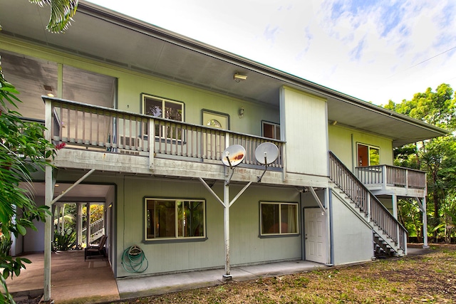 back of house featuring a patio area