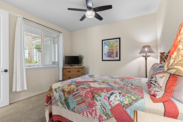 bedroom featuring ceiling fan and carpet floors