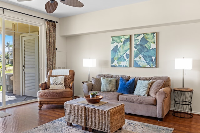 living room with hardwood / wood-style flooring and ceiling fan