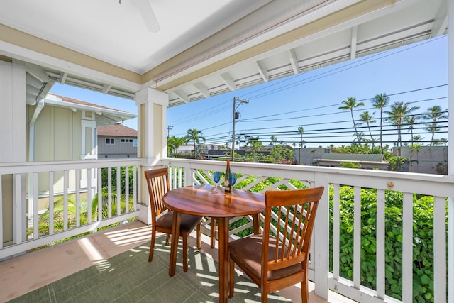 balcony featuring ceiling fan