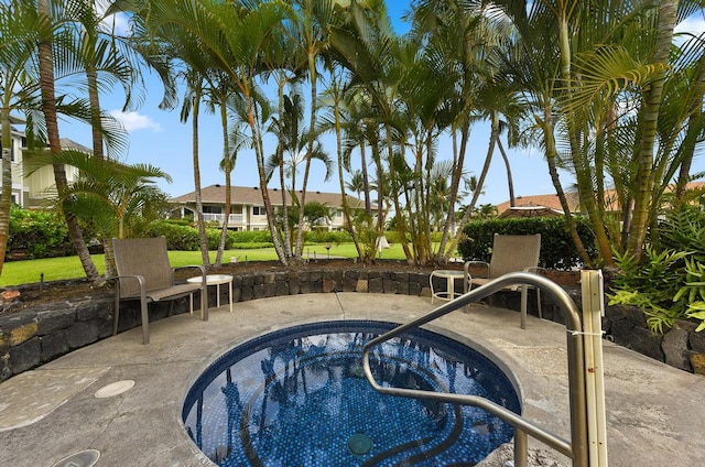 view of pool with a lawn and a patio area