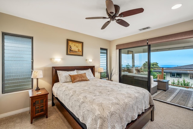 bedroom featuring ceiling fan, light carpet, and access to outside