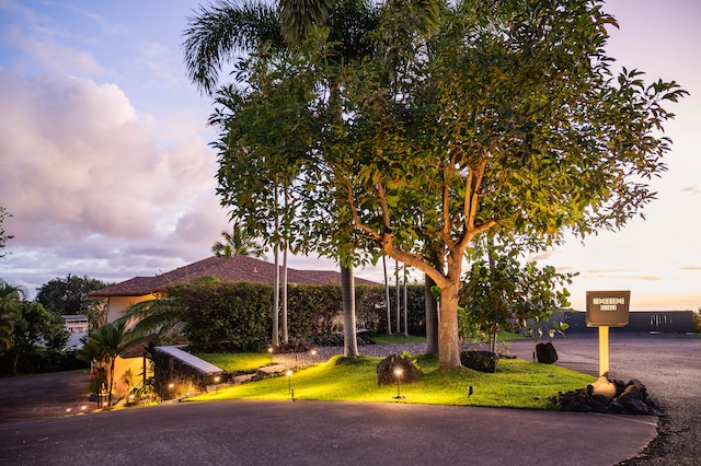 view of property hidden behind natural elements