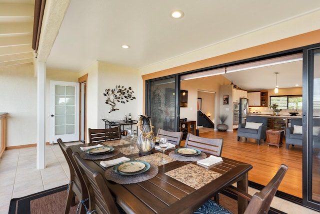 dining area with light hardwood / wood-style floors