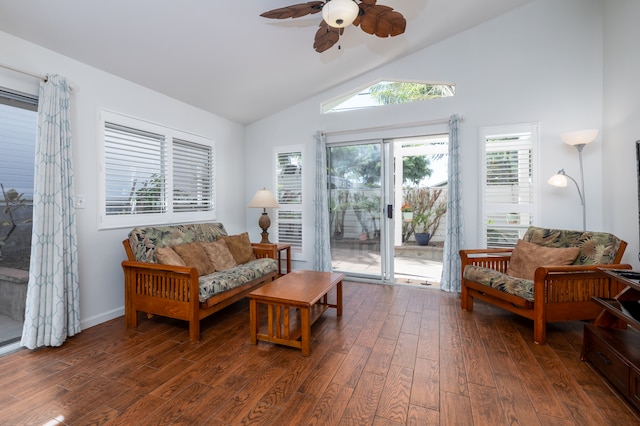 living room with dark hardwood / wood-style flooring, ceiling fan, and lofted ceiling