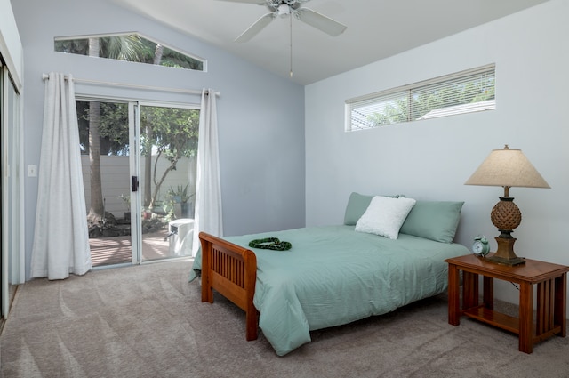 carpeted bedroom with vaulted ceiling, access to exterior, and ceiling fan