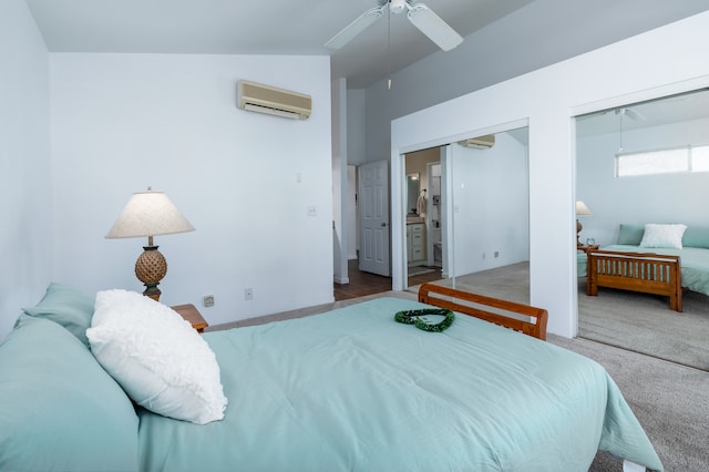 bedroom featuring vaulted ceiling, multiple closets, carpet flooring, ceiling fan, and a wall unit AC