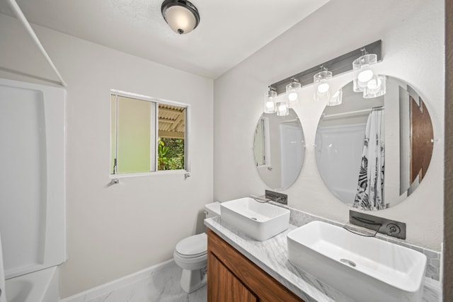 full bathroom with vanity, toilet, and shower / bath combination with curtain