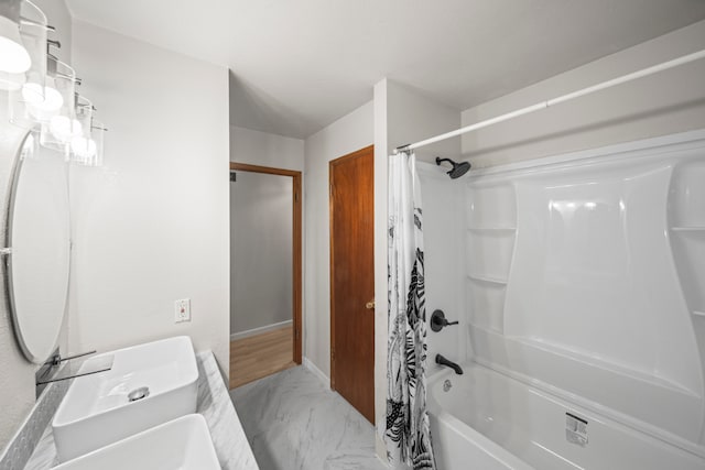 bathroom with vanity and shower / bath combo