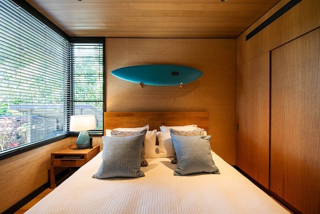 bedroom with wood ceiling