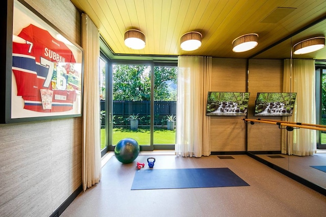 exercise room with wooden ceiling