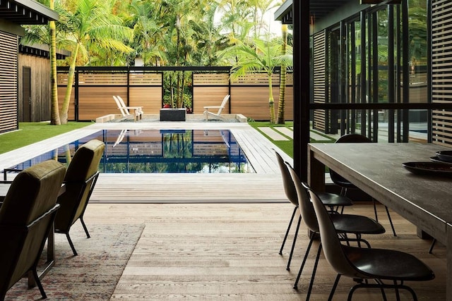 view of swimming pool with a patio area