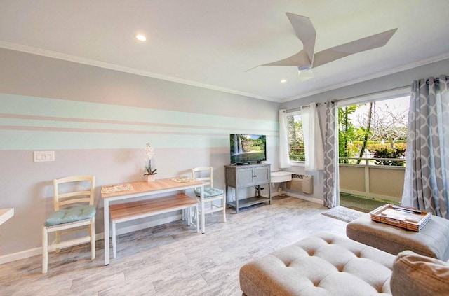 interior space featuring ornamental molding and ceiling fan