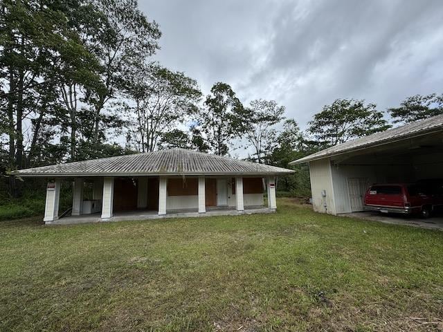 exterior space with a yard