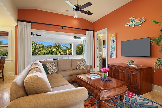 tiled living room featuring lofted ceiling and ceiling fan