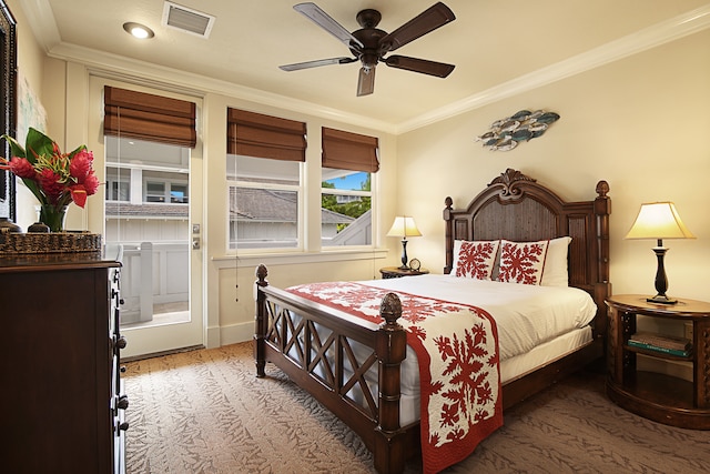 bedroom with crown molding and ceiling fan