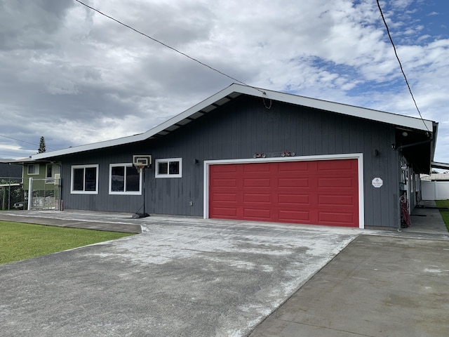 single story home featuring a garage