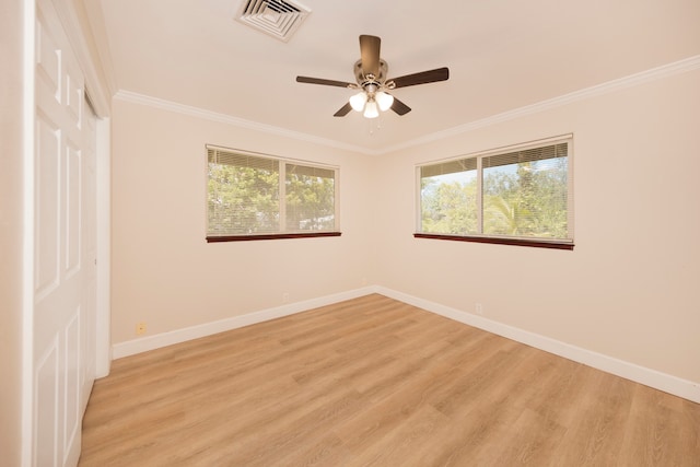 interior space with ceiling fan, light wood-type flooring, and ornamental molding