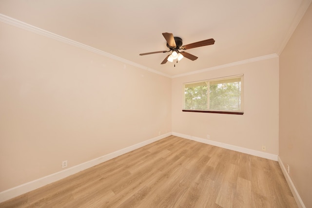 empty room with light hardwood / wood-style floors, ornamental molding, and ceiling fan