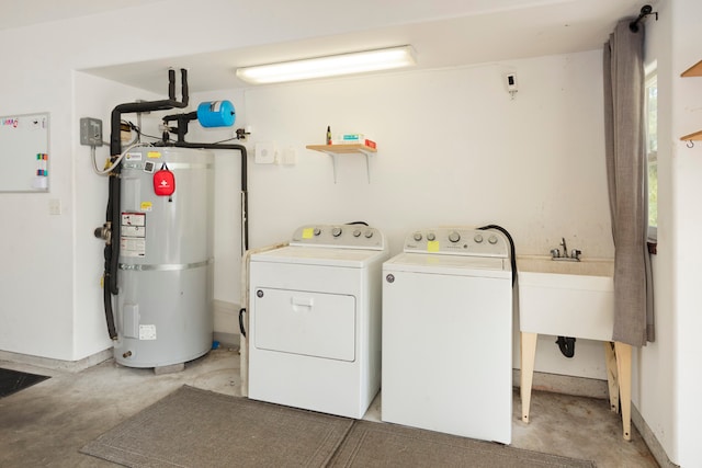 laundry area featuring washer and clothes dryer and water heater