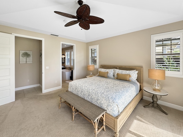 bedroom featuring ceiling fan, carpet floors, and multiple windows