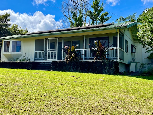 view of front of property with a front lawn