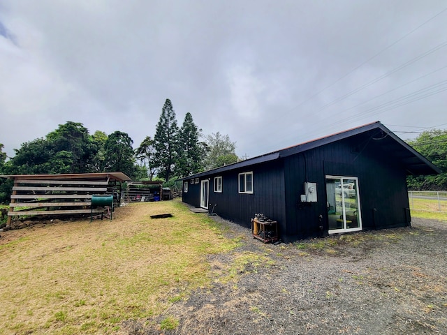 exterior space featuring an outbuilding