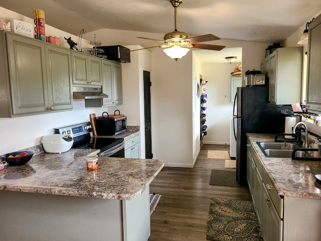 kitchen with vaulted ceiling, dark hardwood / wood-style floors, kitchen peninsula, black range with electric cooktop, and ceiling fan