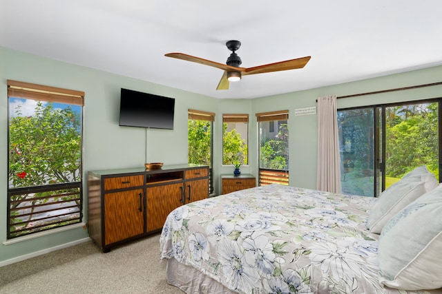 bedroom featuring light carpet