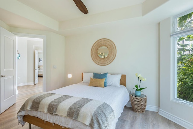 bedroom featuring ceiling fan and light wood-type flooring