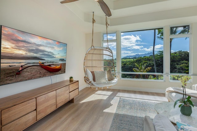 sitting room with light hardwood / wood-style floors