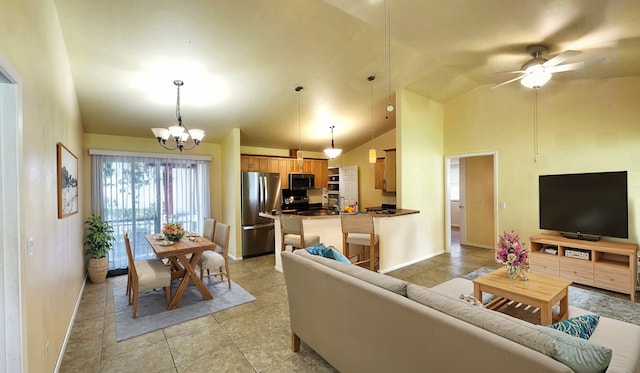 living room featuring high vaulted ceiling, light tile patterned floors, and ceiling fan with notable chandelier