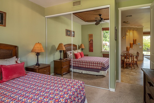 bedroom featuring visible vents and a closet