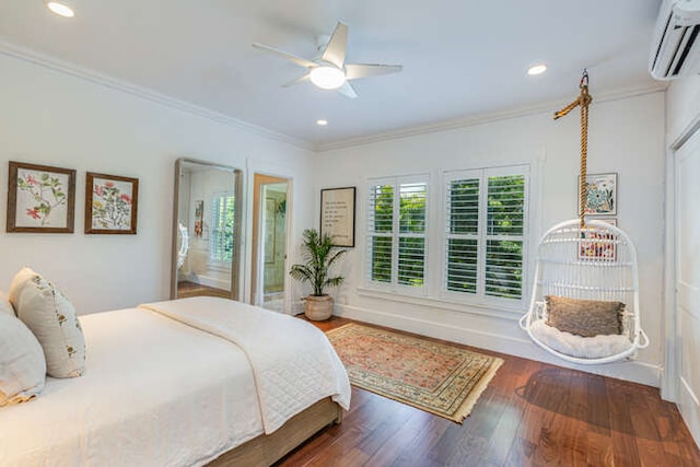 bedroom featuring ceiling fan, dark hardwood / wood-style floors, ornamental molding, and an AC wall unit