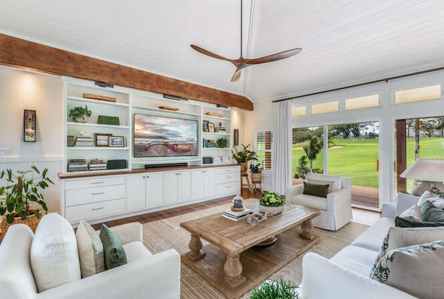 living room featuring ceiling fan, built in features, and light hardwood / wood-style flooring