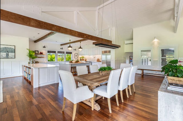 dining space with high vaulted ceiling, beam ceiling, and dark hardwood / wood-style flooring