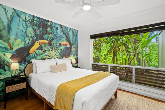 5300 Ka Haku Rd Unit 130, Princeville, HI 96722 - bedroom with ceiling fan and wood finished floors