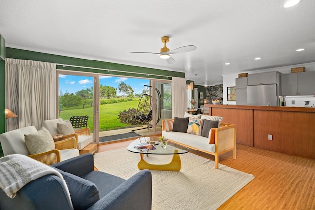 5300 Ka Haku Rd Unit 130, Princeville, HI 96722 - living room with recessed lighting, a ceiling fan, and light wood-style floors