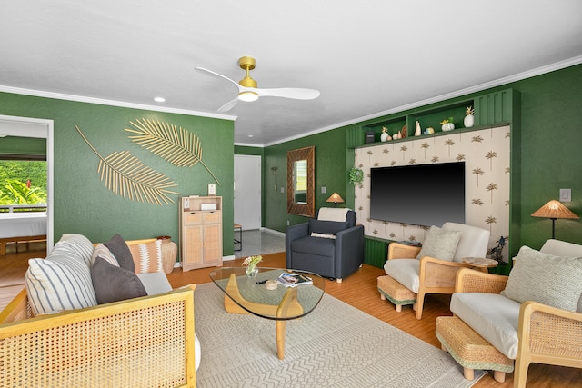 5300 Ka Haku Rd Unit 130, Princeville, HI 96722 - living room featuring wood finished floors, ornamental molding, a textured wall, and a ceiling fan