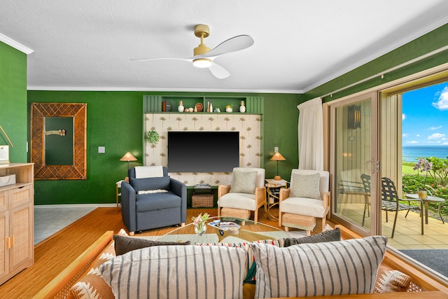 5300 Ka Haku Rd Unit 130, Princeville, HI 96722 - tiled living area with crown molding, baseboards, and a ceiling fan