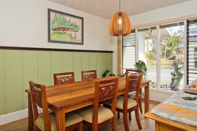 dining area featuring hardwood / wood-style floors