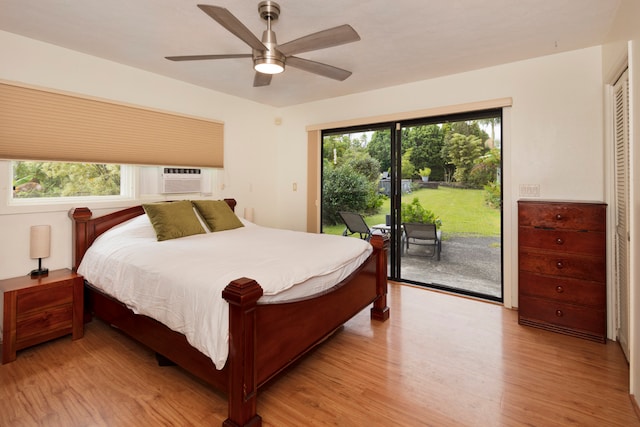 bedroom with ceiling fan, cooling unit, light wood-type flooring, and access to exterior