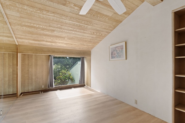 bonus room featuring light hardwood / wood-style flooring, ceiling fan, lofted ceiling, and wood ceiling