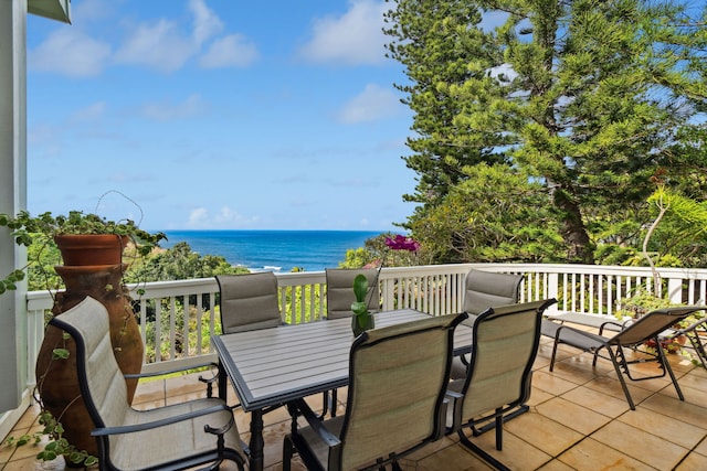 wooden deck featuring a water view