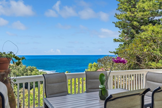 wooden deck featuring a water view