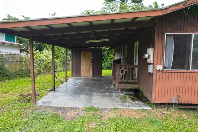 view of patio / terrace with a carport