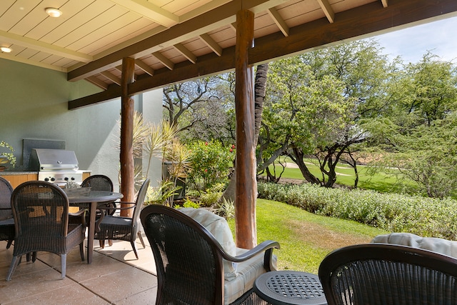 view of patio with a grill