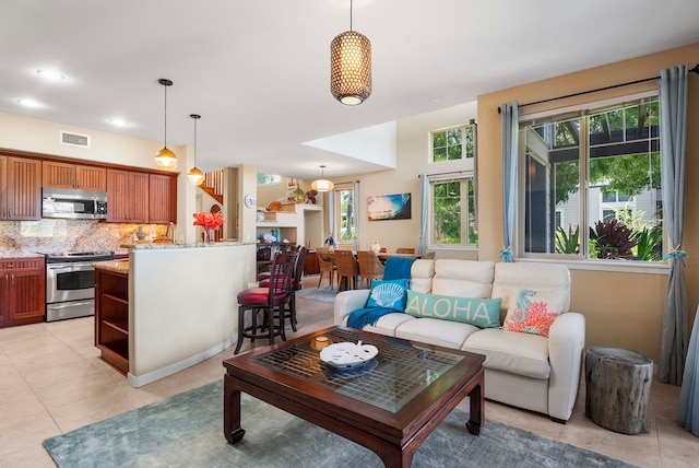 living room featuring light tile patterned flooring