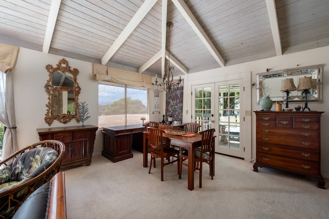 dining area featuring light carpet, vaulted ceiling with beams, french doors, and a notable chandelier