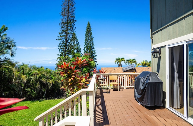 wooden deck with area for grilling